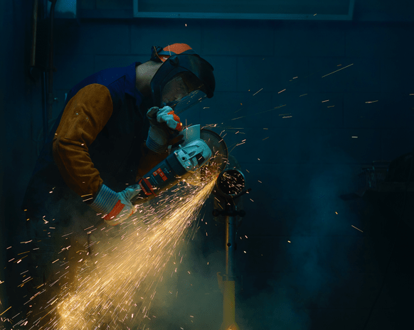 A Union Employee Cutting Metal